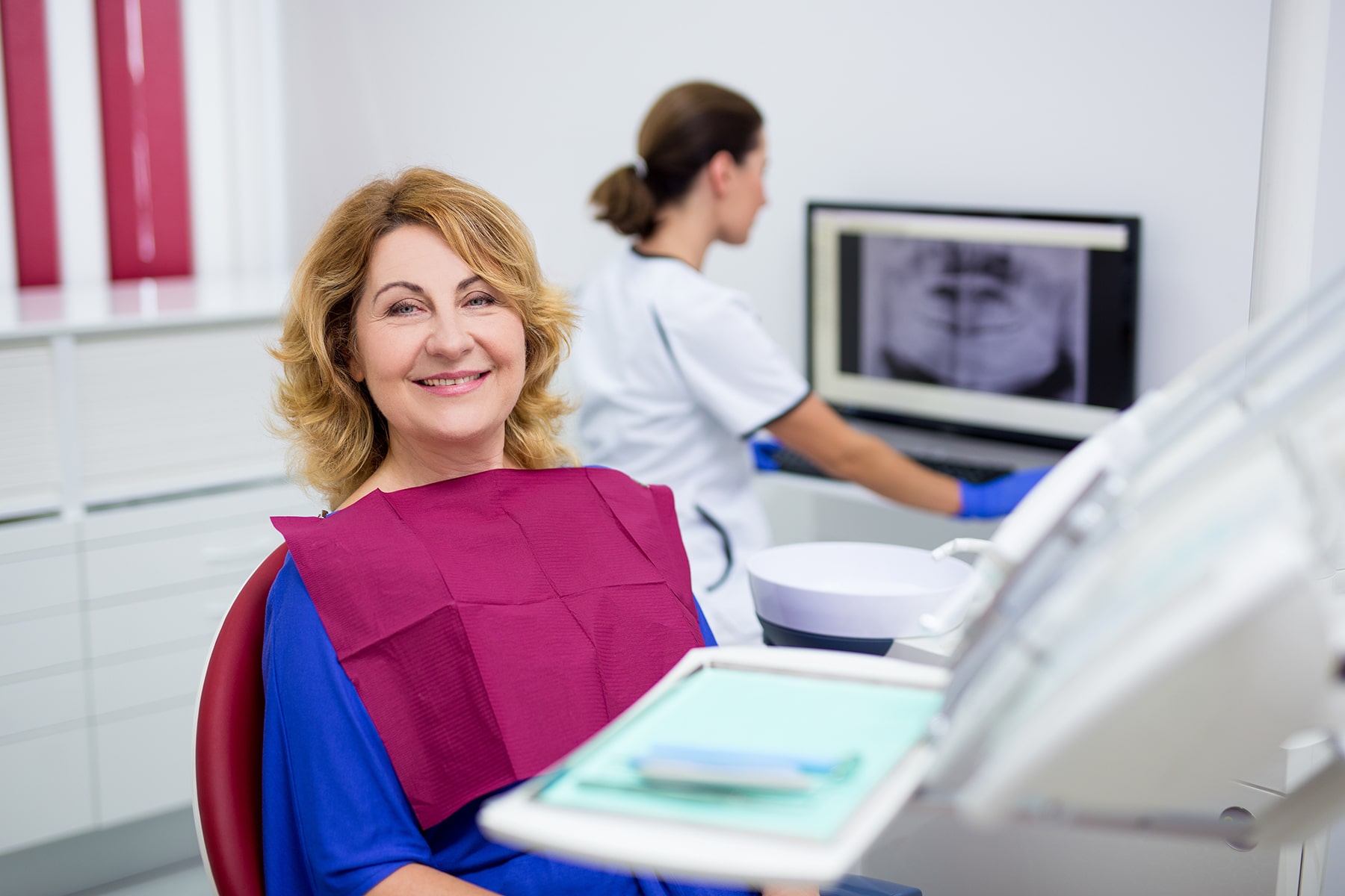 Woman at a dentures dentist in Dawsonville, GA