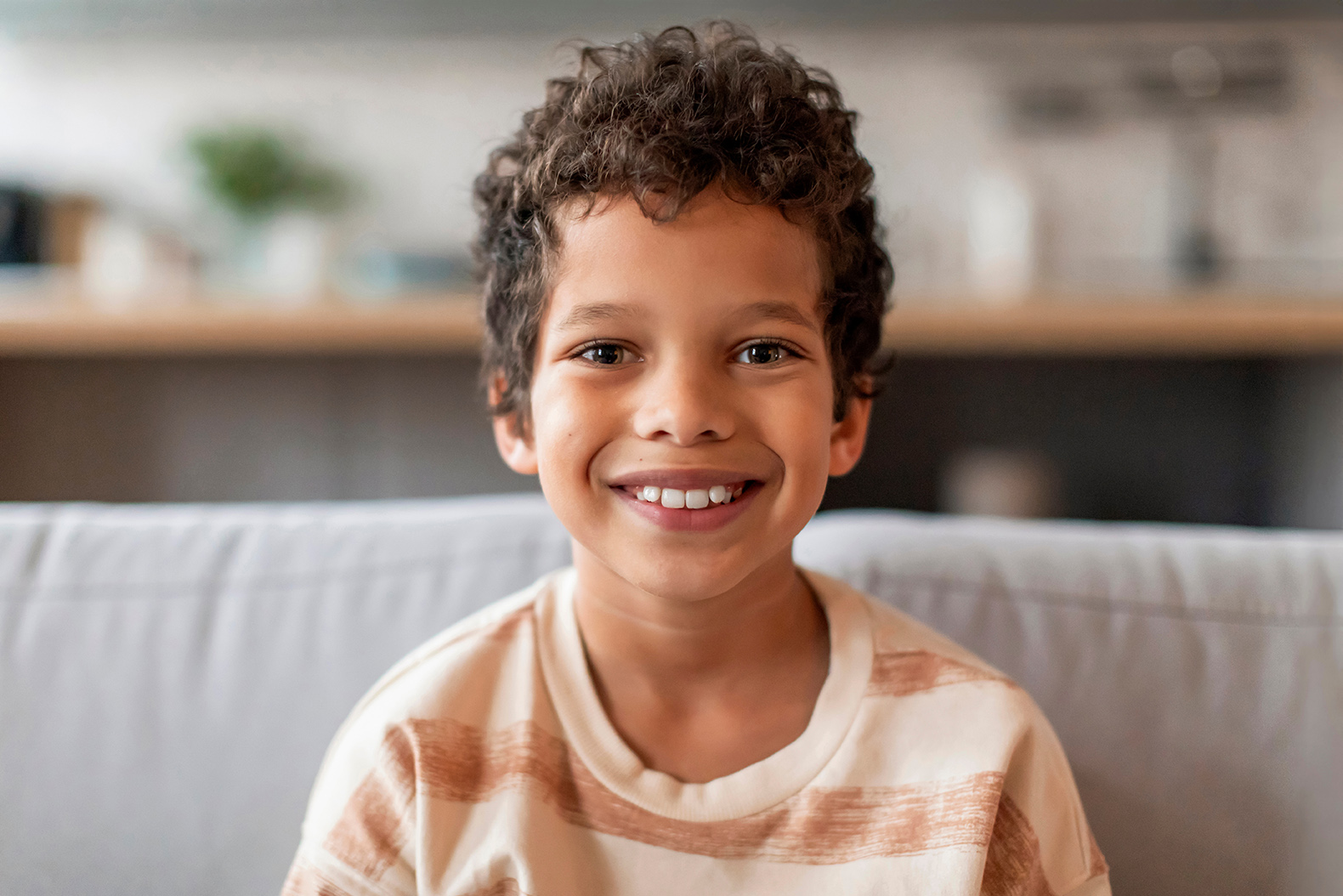 young boy smiling after a dental cleaning at timber ridge dental center